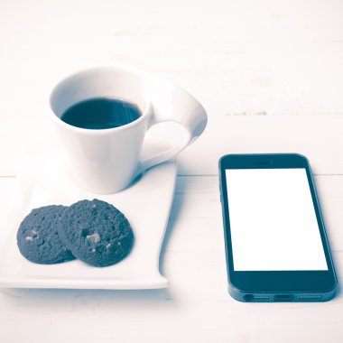 tanımlama bilgisi ve telefon vintage tarzı ile kahve fincanı