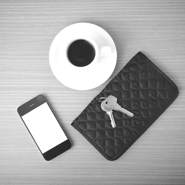 coffee phone key and wallet