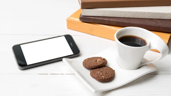 Coffe cup with cookie,phone and stack of book — Stock Photo, Image
