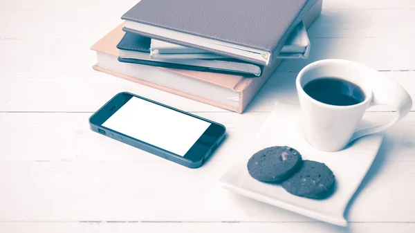 Coffe cup with cookie,phone and stack of book vintage style — Stock Photo, Image