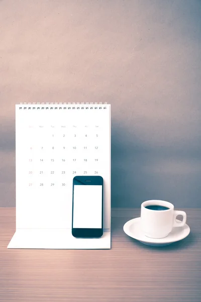 Filiżanka kawy i telefon i kalendarz — Zdjęcie stockowe