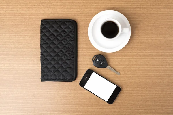 Coffee cup with phone car key and wallet — Stock Photo, Image