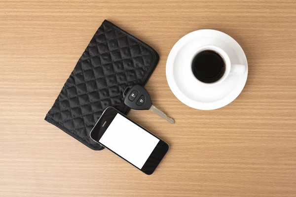 Coffee cup with phone car key and wallet — Stock Photo, Image