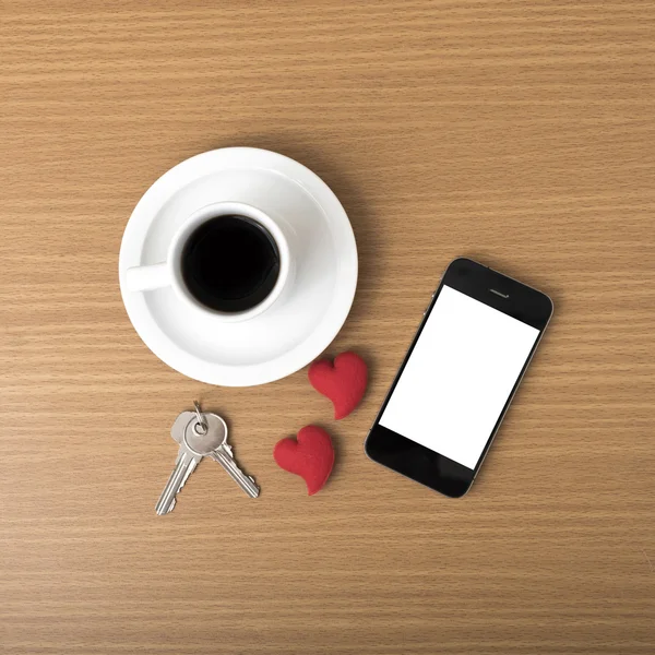 Ключ кавового телефону і серце — стокове фото