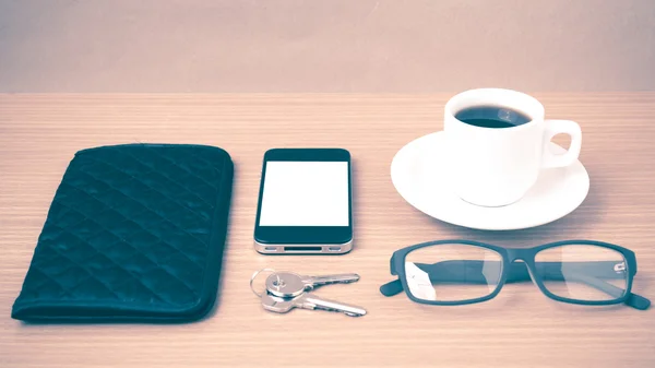 coffee,phone,key,eyeglasses and wallet