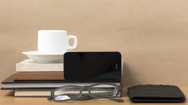 Coffee,phone,eyeglasses,stack of book and wallet — Stock Photo, Image