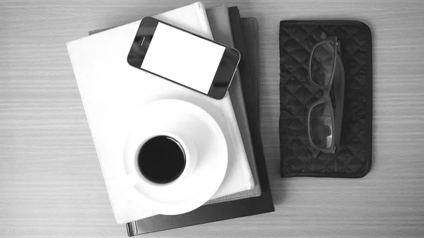 Coffee,phone,eyeglasses,stack of book and wallet — Stock Photo, Image