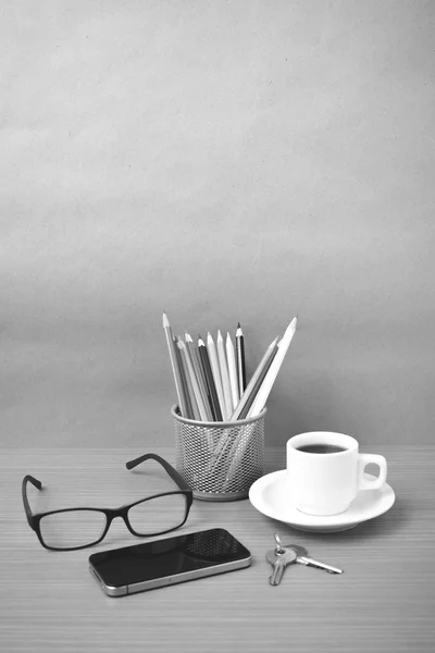 Coffee, phone, eyeglasses, color pencil and key — стоковое фото