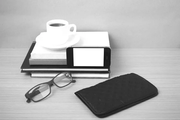 Coffee,phone,eyeglasses,stack of book and wallet — Stock Photo, Image