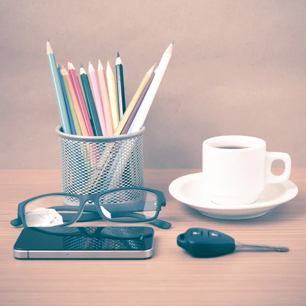 Coffee, phone, eyeglasses, color pencil and car key — стоковое фото