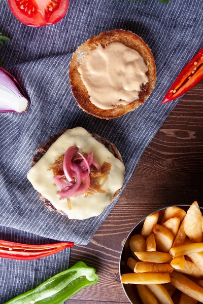 Cheese Burger Caramelized Onions French Fries Royalty Free Stock Images