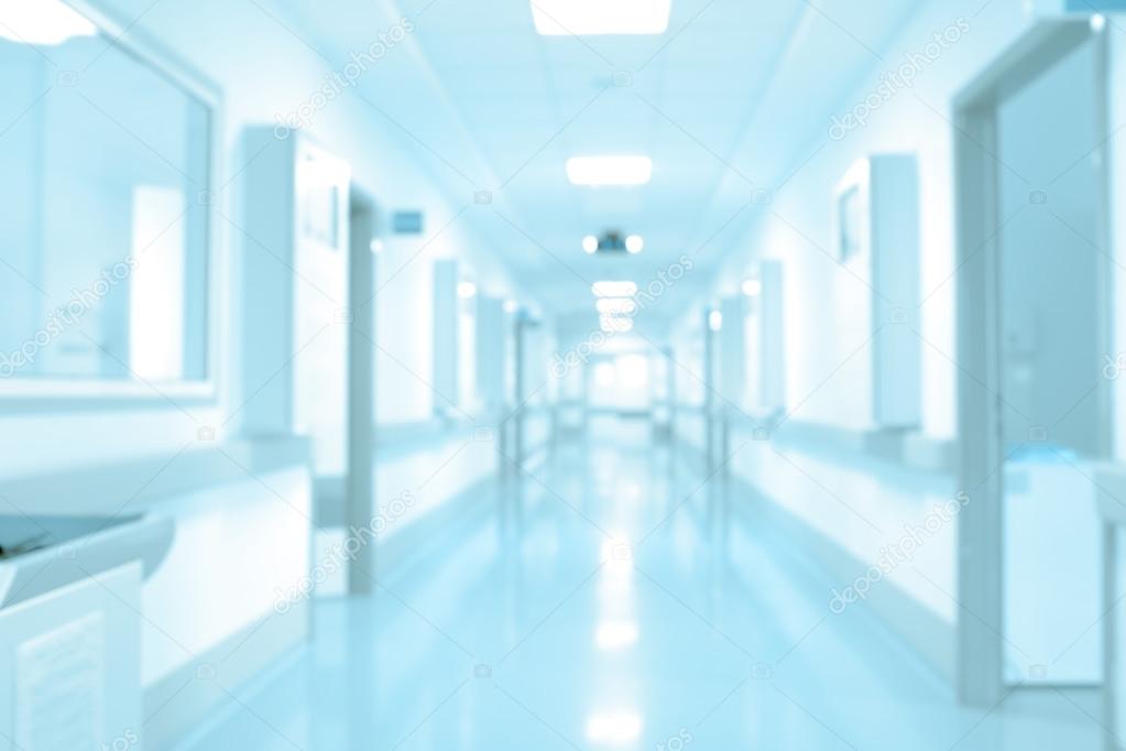 Long hospital hallway, background unfocused