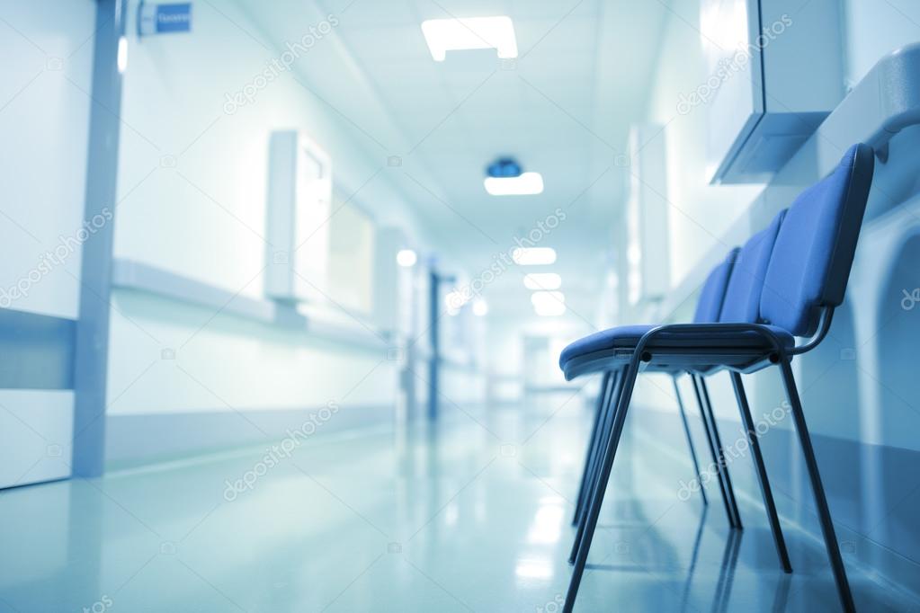 Deserted hospital corridor, concept of extended waiting