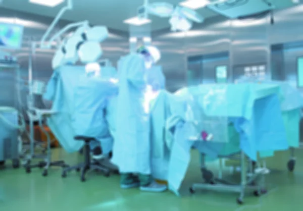 Squadra chirurghi operativa, sfondo sfocato — Foto Stock
