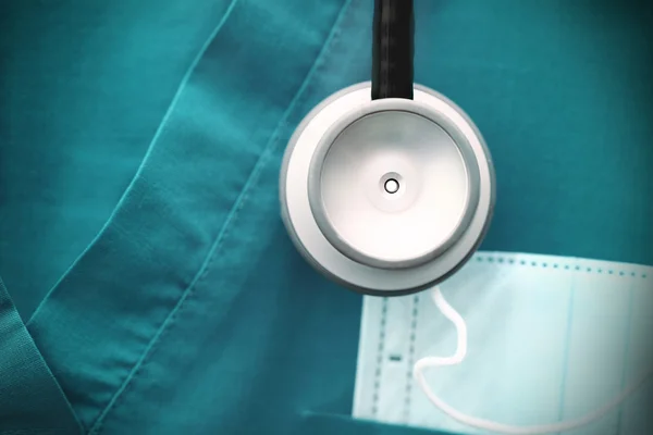 Stethoscope on the medical garment — Stock Photo, Image