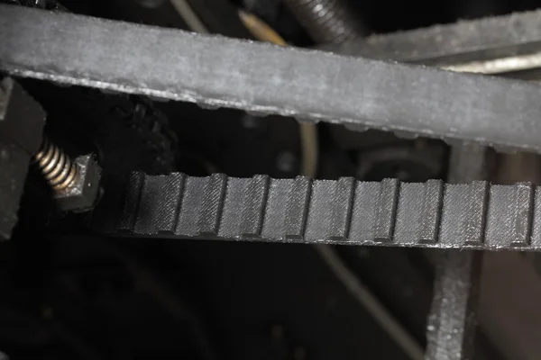 Belt transmission in a mechanical machine.