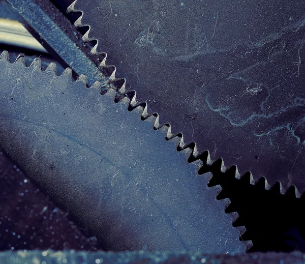 Collaboration of two gear wheels macro — Stock Photo, Image
