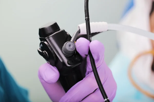 Endoscope in doctors hand macro — Stock Photo, Image