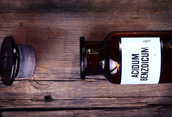 Old chemical bottle with label — Stock Photo, Image