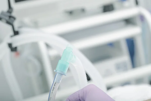 Part of respiratory equipment with doctors hand — Stock Photo, Image