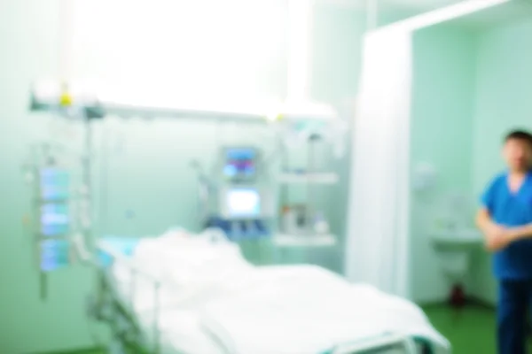 Лікар у лікарні, осквернений фон — стокове фото