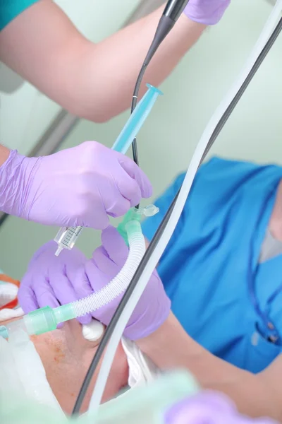 Cleaning endotracheal tube of the patient — Stock Photo, Image