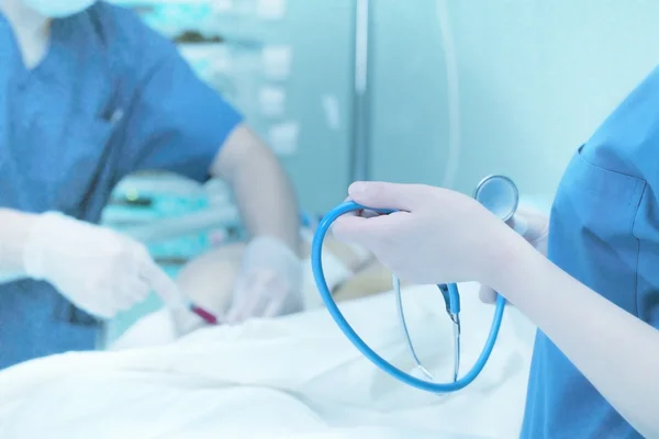 Assistant holding stethoscope in hands — Stock Photo, Image