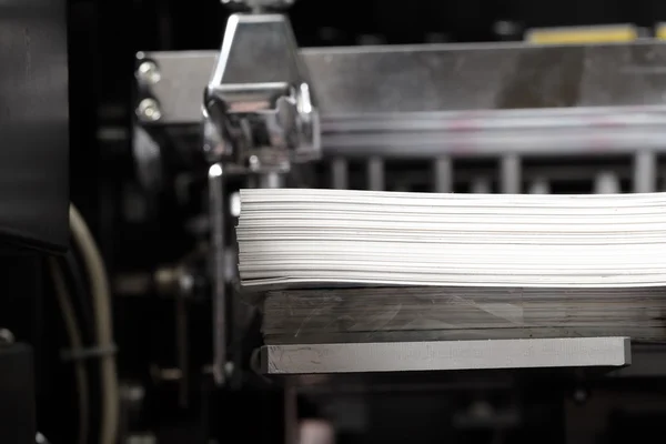 Stack of paper in a printing press — Stock Photo, Image