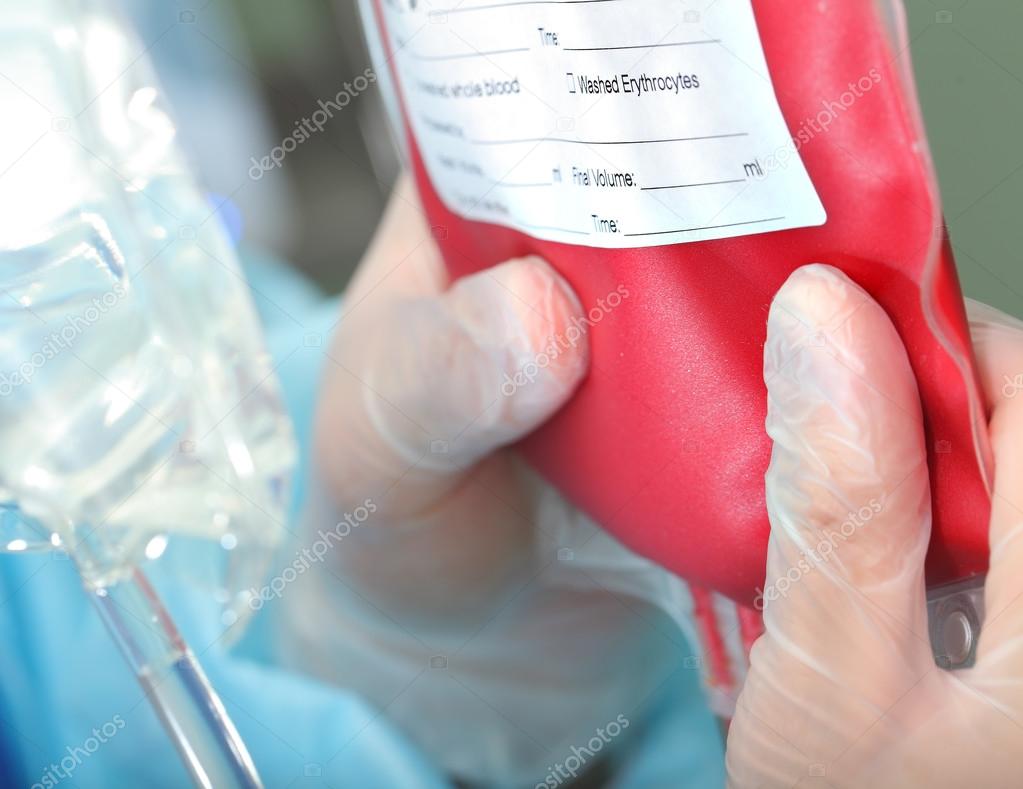 Blood transfusion. Doctor preparing a dose 