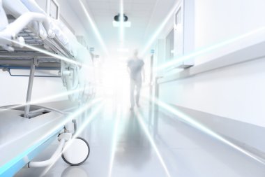 Beyaz tünel ve arka planda bir sembolü olarak bulanık siluet