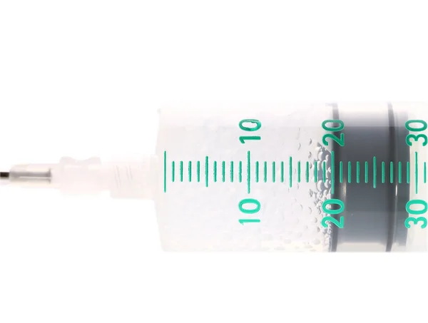 Isolierte Spritze mit Medikamententropfen auf weißem Hintergrund — Stockfoto