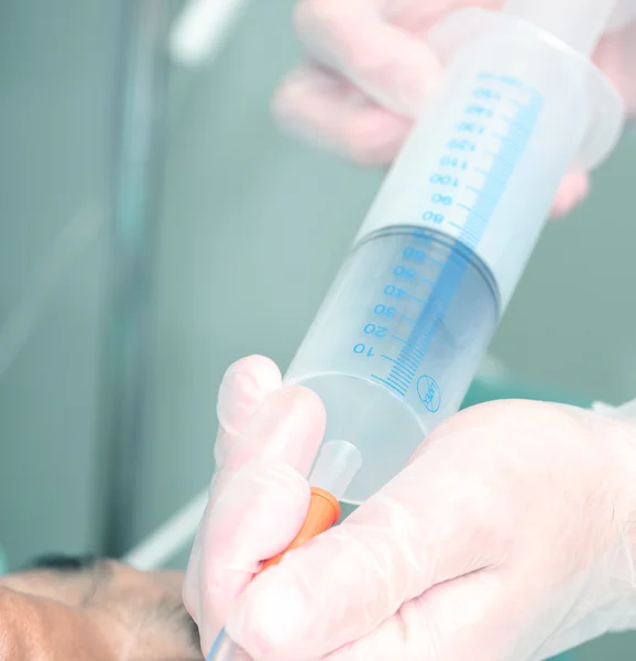 Syringe for feeding the patient — Stock Photo, Image