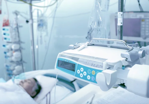 ICU ward with patient unconscious — Stock Photo, Image