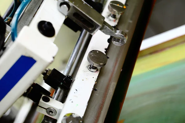 Detail of silk screen printing machine in the workshop — Stock Photo, Image