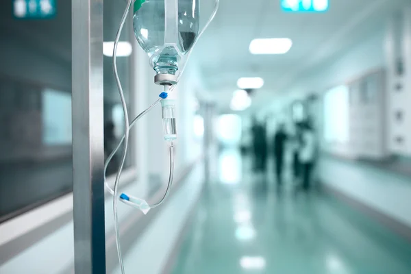Drip on the background a hospital corridor — Stock Photo, Image