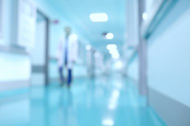 Medical and hospital corridor defocused background with modern l clipart