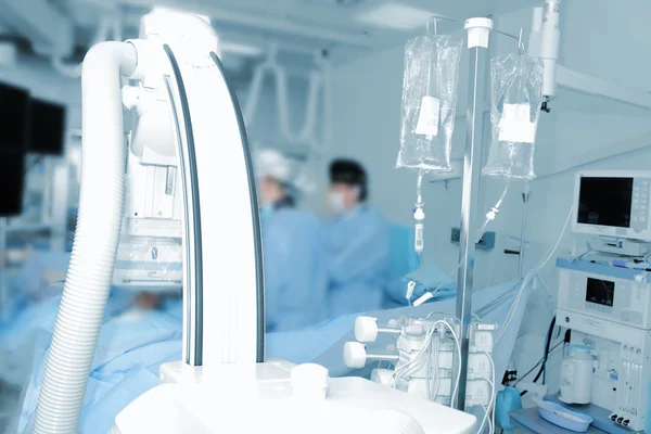 Surgeons in operating room — Stock Photo, Image