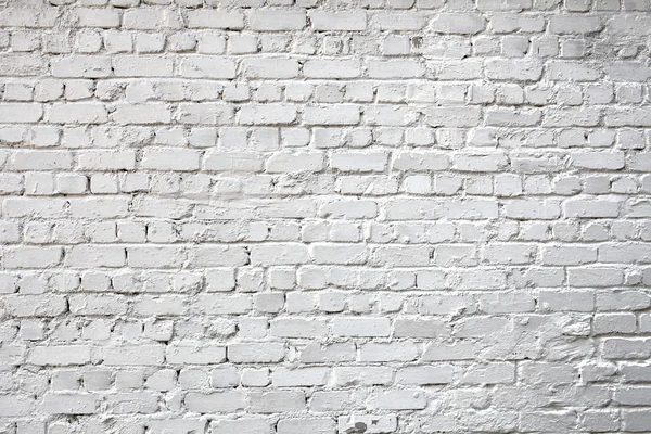 Whitewashed tijolo parede da cidade para o fundo — Fotografia de Stock