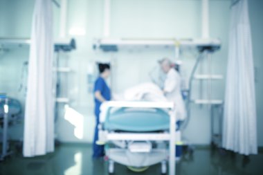 Doktorlar, sabırlı, tıbbi arka plan defocu başucu