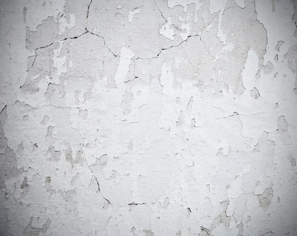 Поцарапанная белая стена — стоковое фото