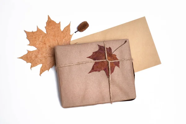 Gift Craft Paper Autumn Leaves White Background Concept Autumn Discounts — Stok fotoğraf