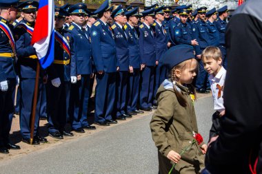 Saint-Petesbur, Russia, May 2020: Soldiers marching parade with russian flag for veterans on victory day may 9 in the World War 2  clipart