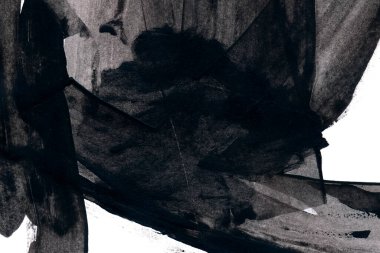 Soyut siyah darbelerle elle boyanmış doku.