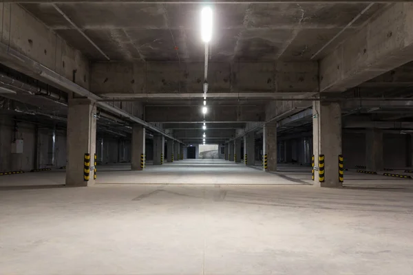 Parking for cars within the city. Empty underground parking. Free parking spaces. Alternative parking.