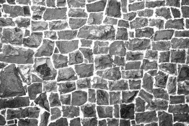 Çakıl taşlarından yapılmış taş duvar. Önden bak. GİZLİ SÜRÜN.