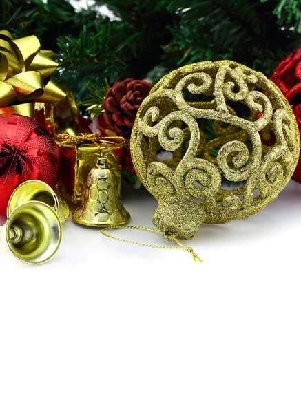 Christmas background with a golden ornament and decorations — Stock Photo, Image