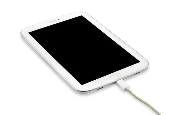 Opladen van Tablet pc geïsoleerd op witte achtergrond — Stockfoto