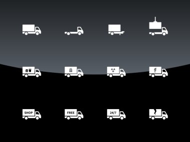 Teslimat ve kargo kamyon simgeler siyah arka plan üzerine.