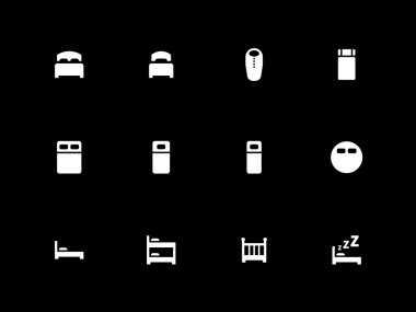 Yatak simgeler siyah arka plan üzerine.