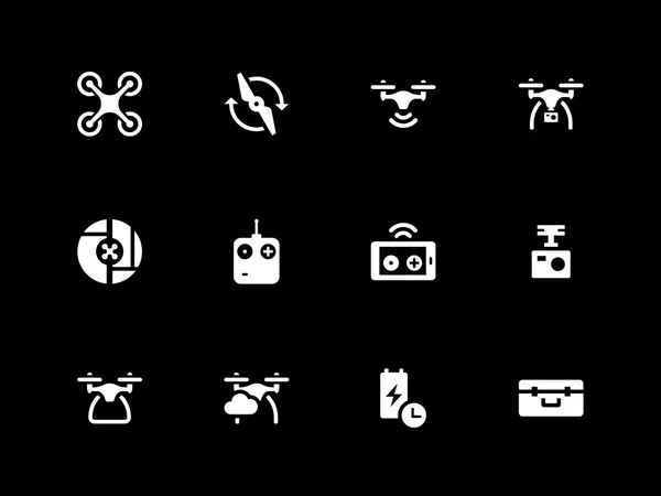 Drone e icone telecomando wireless su sfondo nero . — Vettoriale Stock